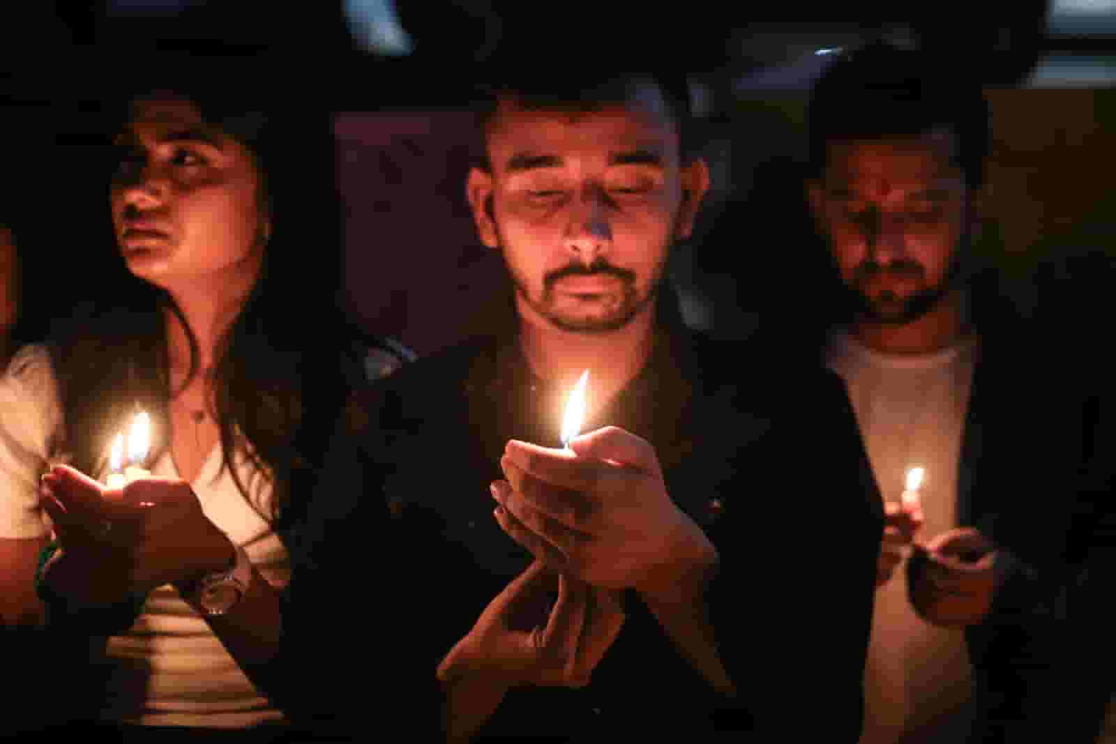 Nepali students hold candlelight vigil commemorating the 10 Nepali students killed in Hamas’s attack on Israel. The group also prayed for world peace. (Sanjit Pariyar/NurPhoto via Getty Images)