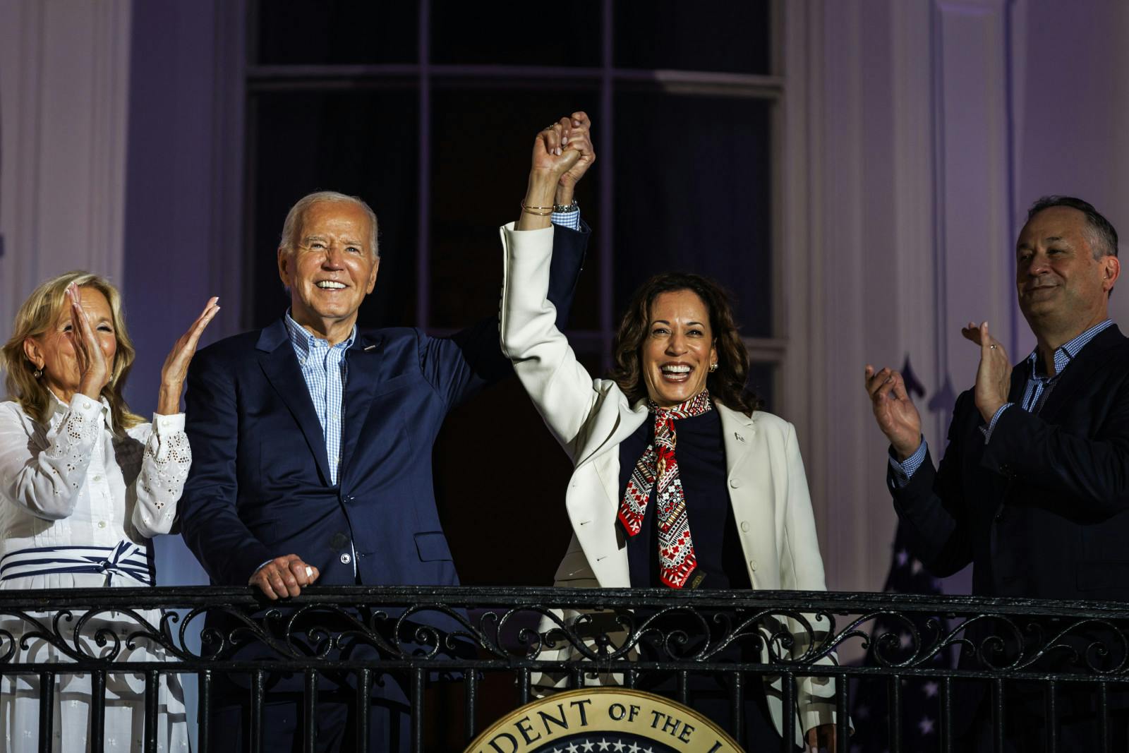 U.S. President Joe Biden and VP Kamala Harris from the White House balcony on July 4, 2024 (Samuel Corum/Getty Images)