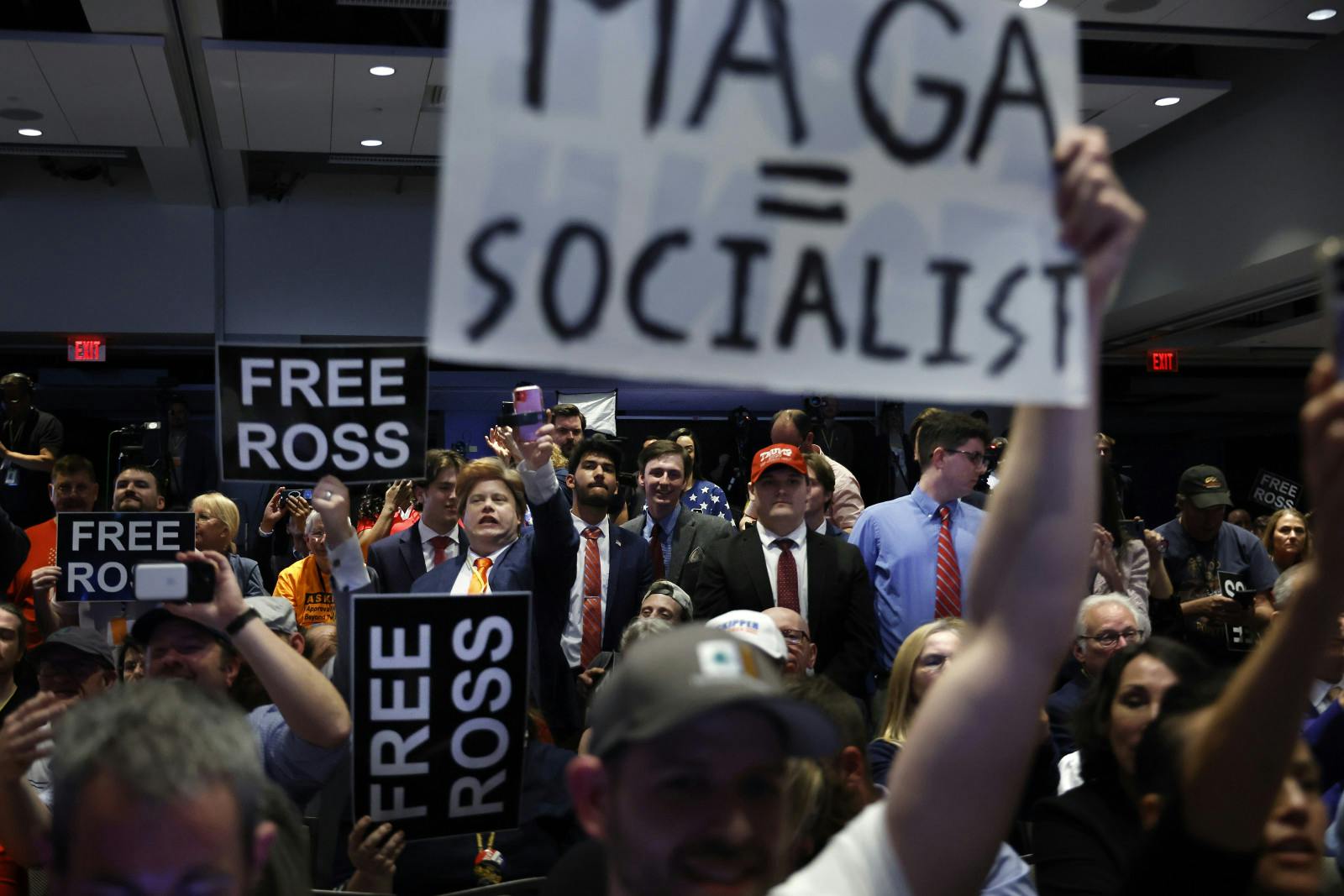 Supporters and critics of former U.S. President and Republican presidential candidate Donald Trump cheer and jeer as Trump addresses the Libertarian Party National Convention at the Washington Hilton on May 25, 2024 in Washington, DC. (Chip Somodevilla/Getty Images)