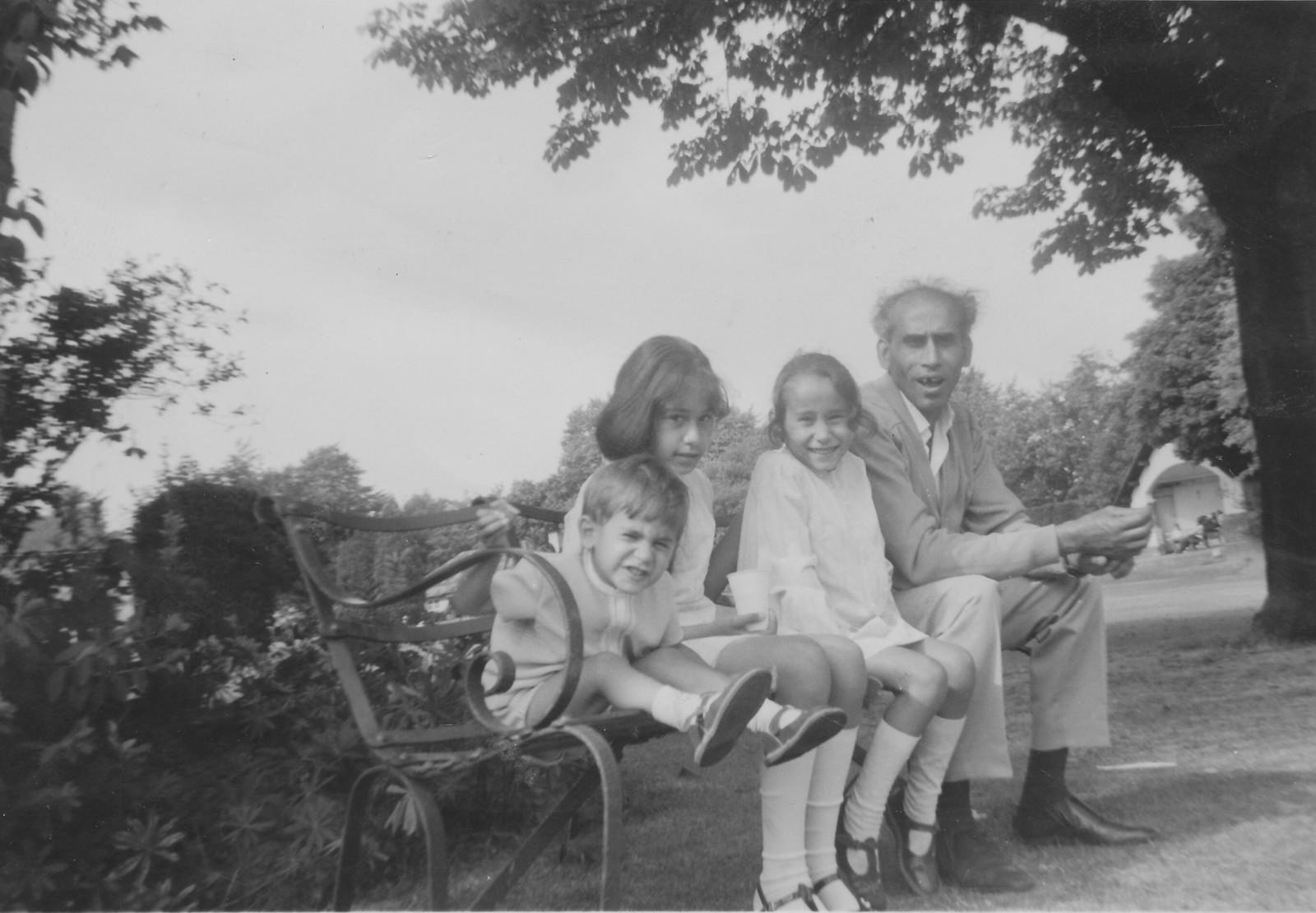 Moi Ali with her father, Asuk Ali, and siblings in the early 1970s (Moi Ali)